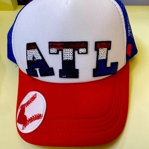 Red, blue and white brand new hat with ATL and baseball patches